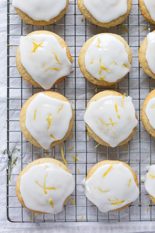 A row of glazed lemon cookies