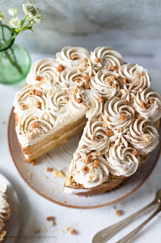 topdown shot of apple crumble cake with slice missing