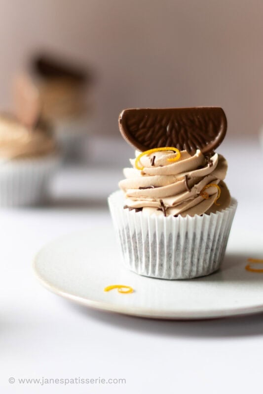A single Chocolate Orange Cupcake on a plate