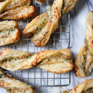 Close up of Cheese Straws crispy on a baking tray