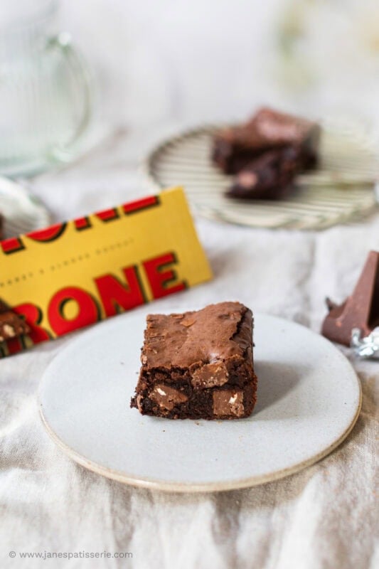 Toblerone packaging with a toblerone brownie on a plate