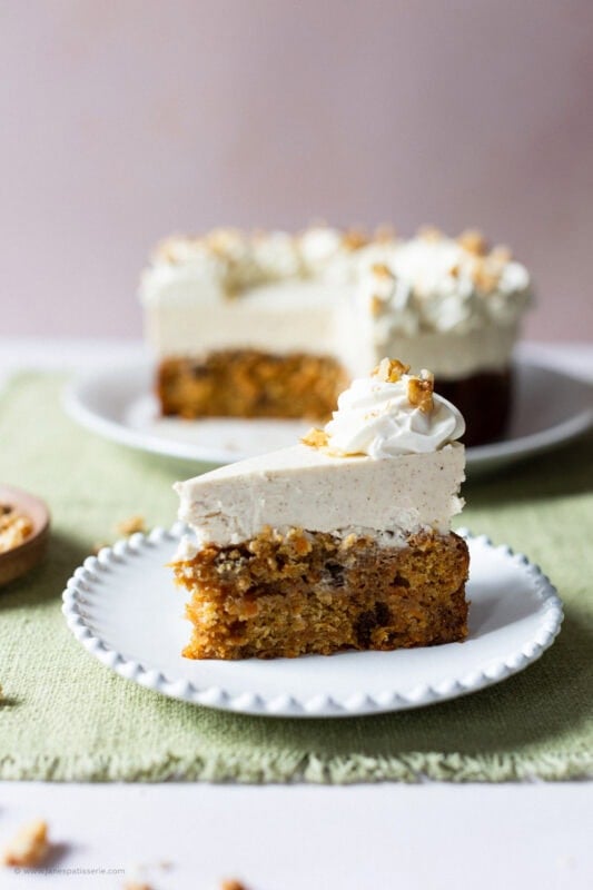 A slice of carrot cake cheesecake