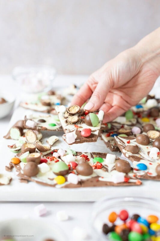 A hand holding some chocolate bark