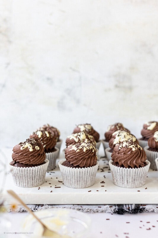 A tray of Chocolate Cupcakes in white cases
