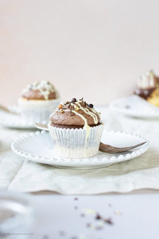 A finished marble cupcake on a white plate