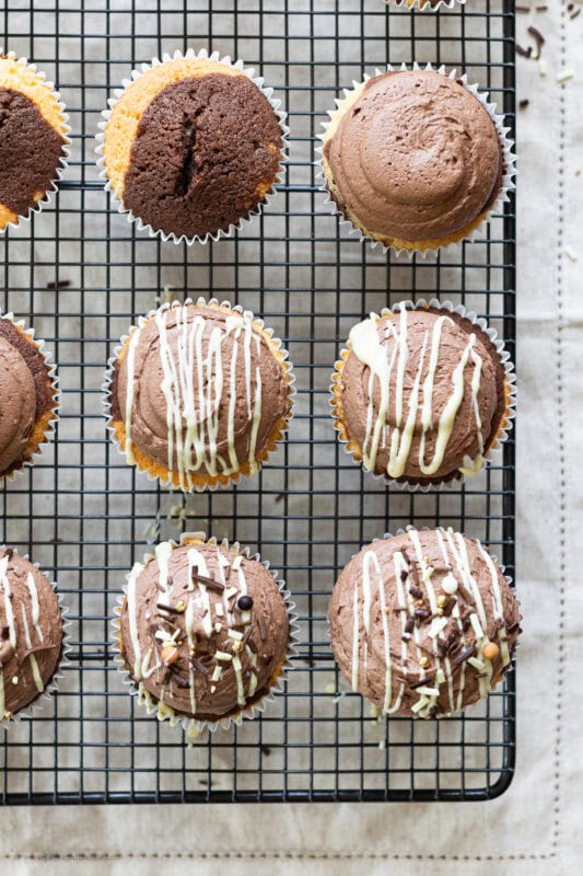 A cooling tray of marble cupcakes