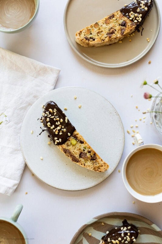 A plate with a Pistachio Hazelnut Chocolate Biscotti