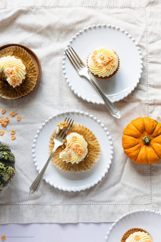Two plates with Pumpkin Cupcakes on them