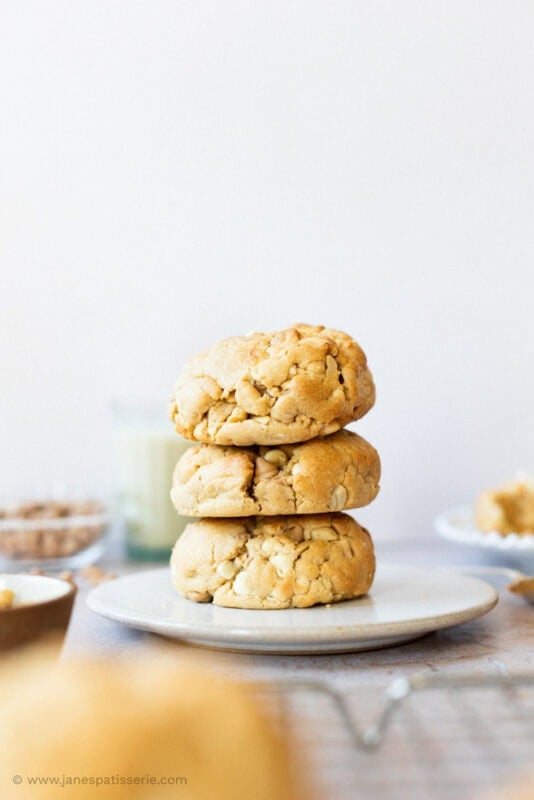 A stack of three Peanut Butter NYC Cookies