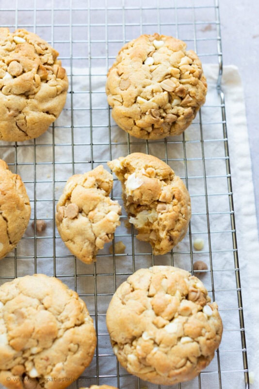A broken Peanut Butter NYC Cookies on a cooling tray