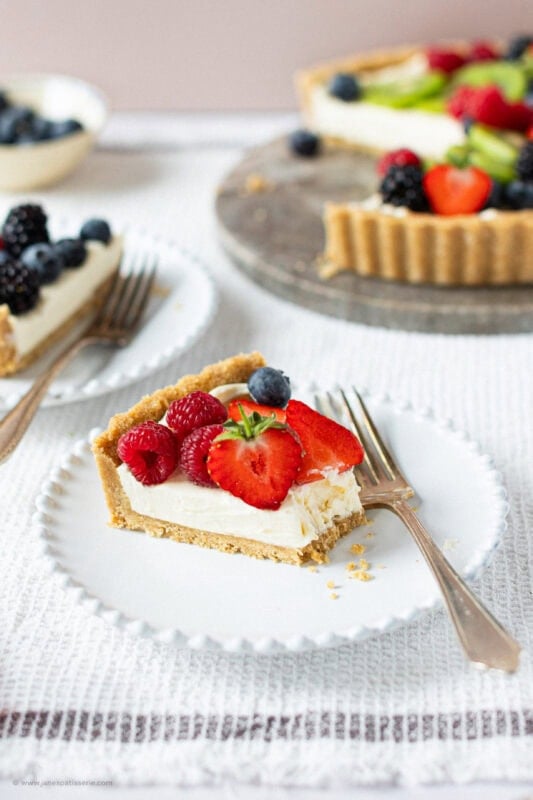 A bite taken from the Easy Fruit Tart slice.