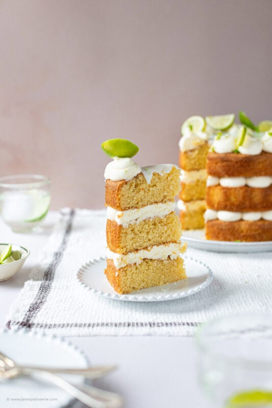 A slice of a gin and tonic cake on a plate
