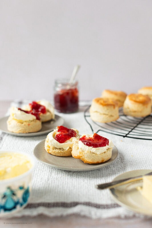 A couple of Classic Buttery Scones on a plate