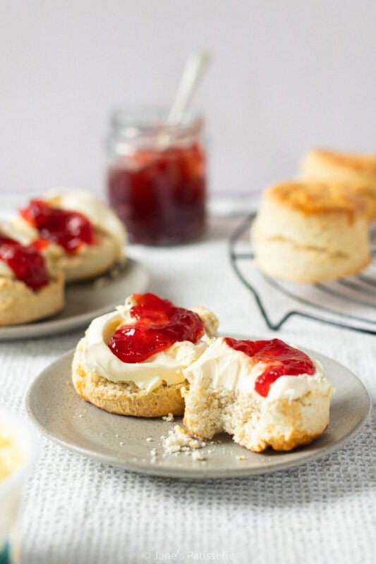 A bite taken from a classic buttery scone