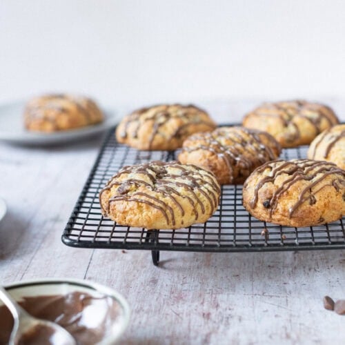 A cooling rack of freshly made coconut chocolate rocks