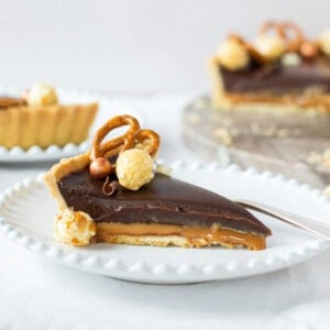 A side angle of a slice of Salted Caramel Tart