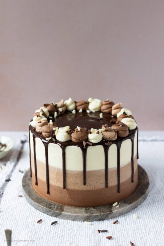 A whole Triple Chocolate Cake on a table