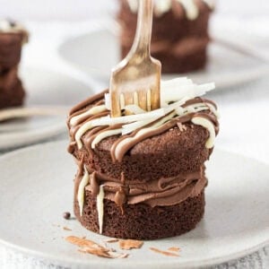A fork slicing into a Mini Chocolate Cake