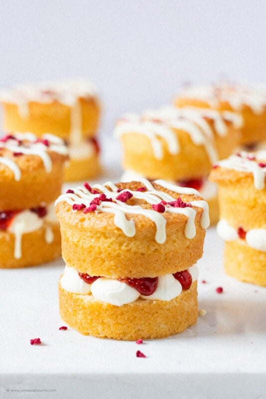 A close up of a decorated mini Victoria sponge cake