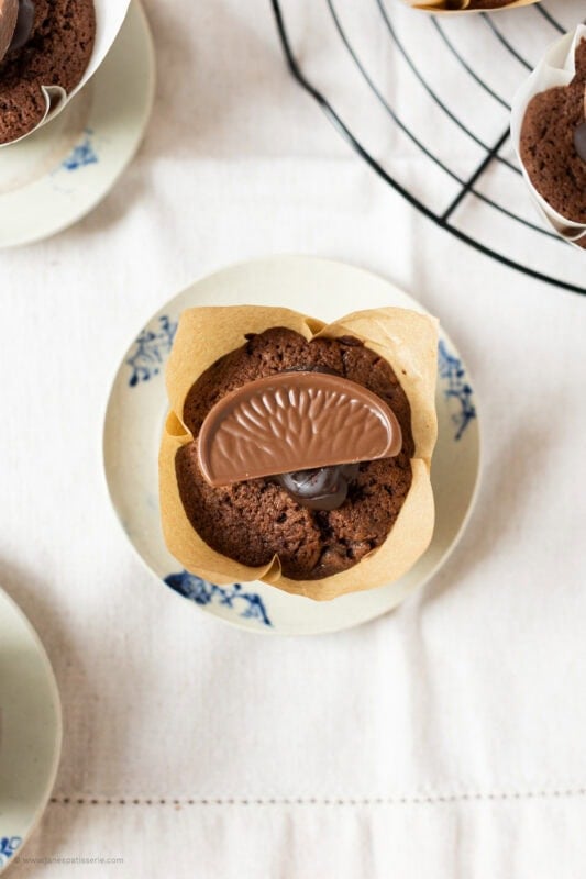 Bidseye shot of. a Chocolate Orange Muffin on a plate