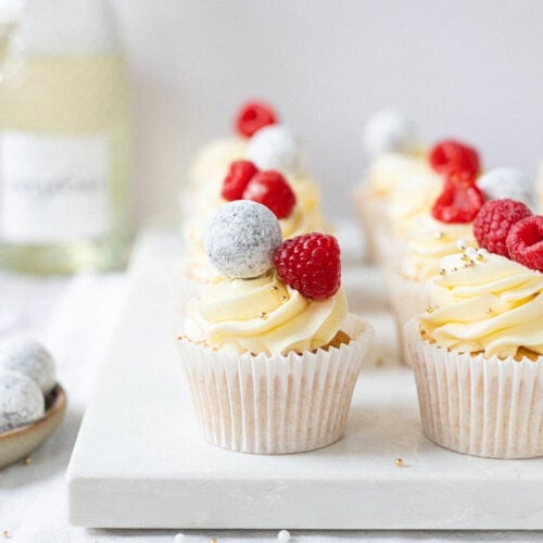 A group of fully decorated Prosecco Cupcakes