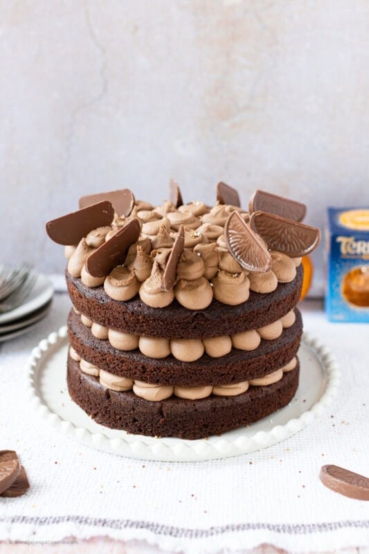 A whole Terrys chocolate orange cake on a serving dish